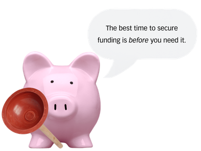 A pink piggy bank holding a plunger, with a speech bubble that says 'The best time to secure funding is before you need it.'