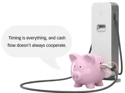 A pink piggy bank plugged into a car charging port, with a speech bubble that says 'Timing is everything, and cash flow doesn't always cooperate.'.